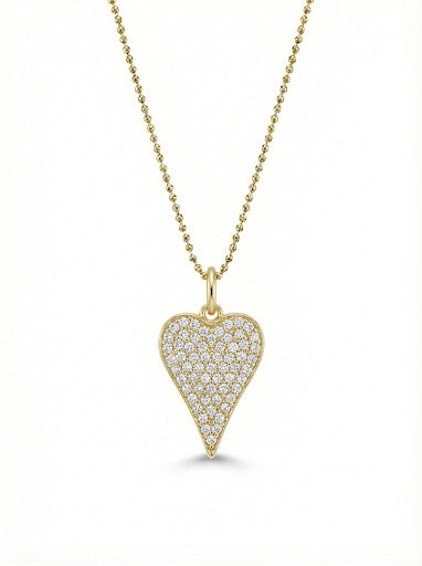 14Kt gold heart pendant featuring pave set diamonds