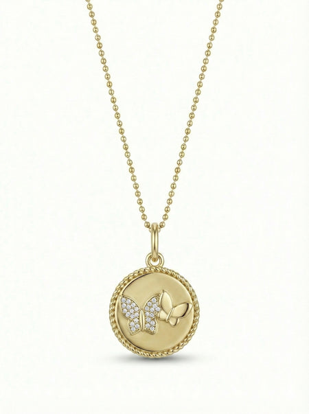 14Kt gold disc pendant featuring 2 butterflies -diamond encrusted