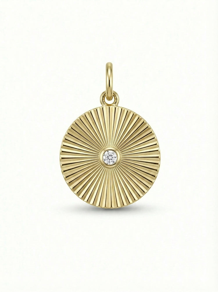 14Kt gold sunburst pattern disc pendant With single diamond